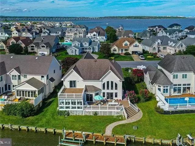 Aerial view of waterfront houses.